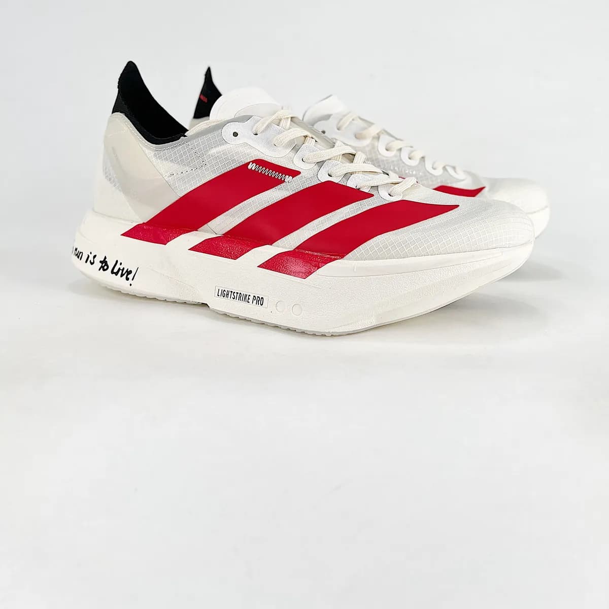 Adizero Adios Pro branco e vermelho
