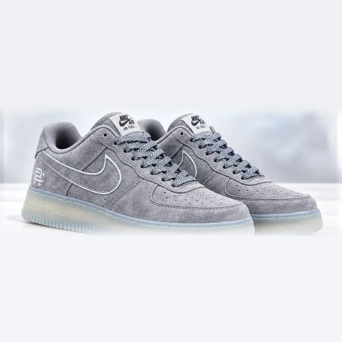 Nike Air Force 1 Low Reigning Champ, cinza